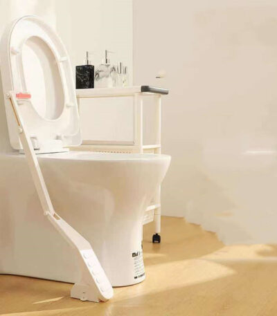 foot operated toilet seat